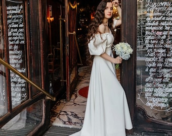 Wedding dress with short sleeves,  off-white colored dress,  winter wedding dress,  modest wedding dress, dress with a train.