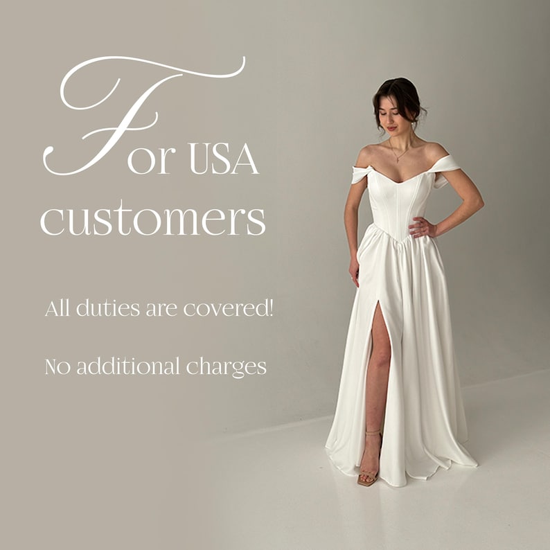 May include: A white off-the-shoulder wedding dress with a high slit. The dress has a fitted bodice and a flowing skirt. The text in the image says "For USA customers" and "All duties are covered! No additional charges".