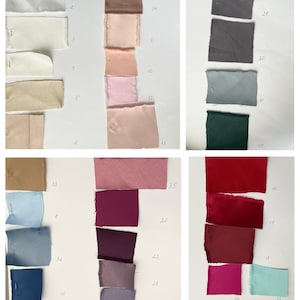May include: A collection of fabric swatches in various colors, including white, beige, pink, gray, blue, and red. The swatches are arranged on a white background, with numbers written on the paper. The fabric appears to be satin or silk.