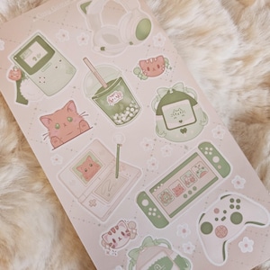 Feuille d'autocollants mignonne et confortable pour la configuration du joueur | Retro Games Virtual Pets Orange Cat Bubble Tea Controller Switch DS | Stickers souples vert sauge