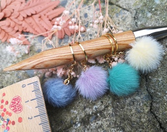 Set of 4 pastel colored pompom marker rings for knitting and crochet