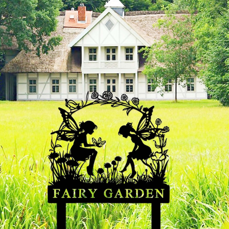 May include: Black metal fairy garden sign with two fairies sitting on a flower bed with the text "FAIRY GARDEN" on the bottom.
