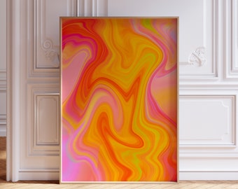 Könnte beinhalten: Abstrakter Kunstdruck mit wirbelnden gelben, orangen und rosa Farben. Der Druck ist in einem dünnen, goldenen Rahmen gerahmt.