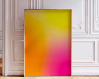 Könnte beinhalten: Ein gerahmter abstrakter Kunstdruck mit einem Farbverlauf von Gelb, Orange und Rosa.