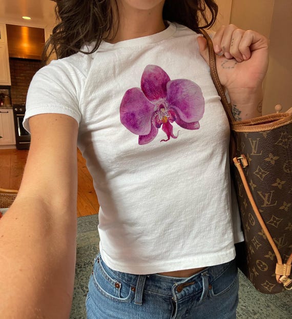 蘭の花のベビーTシャツ グラフィックプリントのベビーTシャツ 