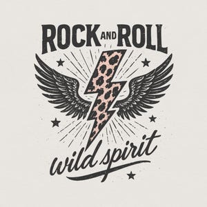 May include: A vintage-style graphic with the words "ROCK AND ROLL" above "wild spirit". A pink and brown leopard print lightning bolt is centered, flanked by black wings. Small stars and radiating lines complete the design.