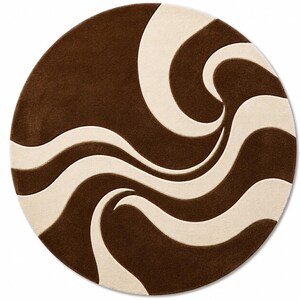 May include: A round rug with a brown and cream-colored swirling pattern. The rug has a soft, plush texture and a modern design. The brown sections are a darker shade, contrasting with the lighter cream-colored waves.