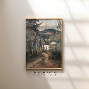 May include: A framed landscape painting depicts a white house nestled among trees and a winding road. The artwork, in muted tones of brown, green, and gray, evokes a vintage aesthetic. The text "DIGITAL DOWNLOAD Timeless Home Prints" is at the bottom.