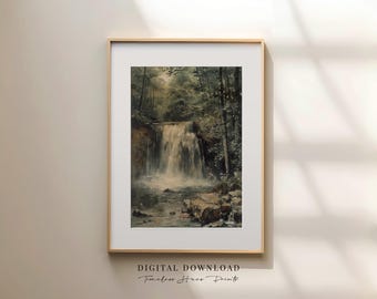 May include: A framed print of a waterfall in a forest setting. The artwork features a waterfall cascading into a pool of water, surrounded by trees. The print is in a gold frame and includes the text "DIGITAL DOWNLOAD Timeless Home Prints."