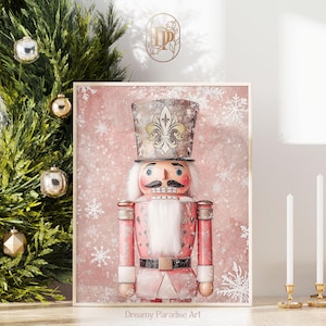 May include: A pink and gold nutcracker with a white beard and a fleur-de-lis on his hat. The background is a pink and white snowflake pattern. The image is titled "Dreamy Paradise Art".