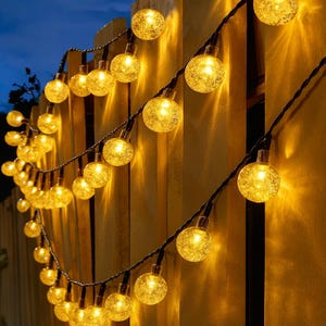 Lampes solaires de jardin : 50 guirlandes lumineuses LED chaudes et imperméables