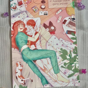May include: A digital illustration of a woman in green pajamas cuddling a man in a red shirt. The woman is smiling and the man is blushing. The image is set in a bedroom with a cat, a video game console, and other items. The text "Average otome game enjoyer" is written in the top right corner.
