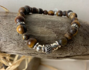 Pulsera de Hombre "Malo Tiger" piedras Ojo de Tigre mate de 8 y 6 mm, espaciadores y cuentas de Plata 925 sobre hilo elástico.