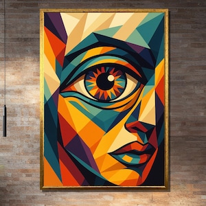 May include: A large framed art print featuring a geometric abstract face. The artwork uses a vibrant palette of orange, yellow, blue, and red. The eye is the focal point, with a detailed iris. The frame is gold.