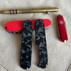 91mm PLUS Victorinox Triangle scales