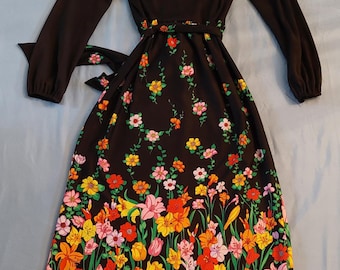 Gown-black top with long sleeves/ bright floral skirt