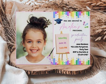 May include: A preschool graduation party invitation featuring a photo of a smiling child. The invitation includes text that reads "You are invited to Amelia's Preschool graduation party" with event details. The design incorporates colorful pencils and a graduation cap.