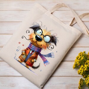 May include: A beige tote bag with a cartoon illustration of a dog wearing a plaid coat, a blue scarf, and round glasses. The dog is smiling and has a whimsical expression.