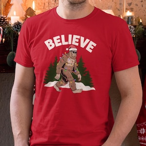 Funny Bigfoot Christmas T-Shirt - Sasquatch Believe Holiday Tee, Cryptid Christmas Gift, Festive Bigfoot Shirt, Xmas Sasquatch Apparel