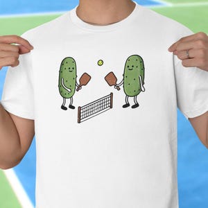 Funny Pickleball T-Shirt - Doodle Style Pickles Playing Pickleball, Unisex Pickleball Shirt, Fun Pickleball Gift for Players