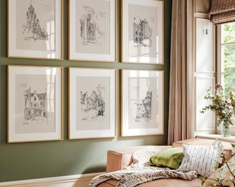 May include: Six black and white framed drawings of buildings, hung on a green wall. The drawings are in a minimalist style and feature simple lines and shapes.