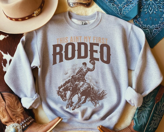 This Ain't My First Rodeo Sweatshirt, Western Sweatshirt, Western Graphic, Cowboy Sweatshirt, Cowgirl Apparel, Rodeo Style, Western Gift