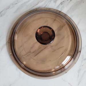 May include: A white ceramic mug with a black handle and the text "But First, Coffee" in a bold, black font. The mug is likely 11 ounces in size, perfect for a morning beverage.