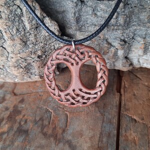 TreeOfLifePendant, YggdrasilJewelry, CelticNorseAmulet, ReclaimedWoodArt, CelticKnotworkPendant, VikingSymbolism, MythologyInspired, HandmadePendant, NorseCelticArt, HistoricalJewelry, NatureLoversGift, EternalLifeSymbol, CelticHighlandArt
