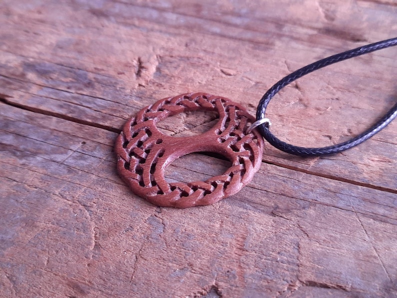 TreeOfLifePendant, YggdrasilJewelry, CelticNorseAmulet, ReclaimedWoodArt, CelticKnotworkPendant, VikingSymbolism, MythologyInspired, HandmadePendant, NorseCelticArt, HistoricalJewelry, NatureLoversGift, EternalLifeSymbol, CelticHighlandArt