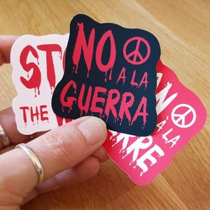 Pegatina vinilo No a la Guerra en 3 colores y 3 idiomas