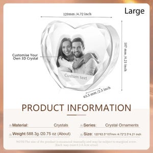 May include: A large, clear crystal heart ornament with a photo of a couple inside. The ornament is 4.72 inches wide, 4.21 inches tall, and 2.5 inches deep. The text "Custom text" is engraved on the bottom of the heart. The ornament is part of a series of crystal ornaments.