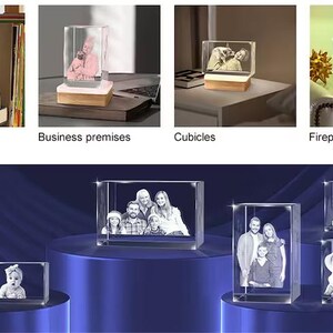 May include: A collection of 3D crystal photo frames with different images inside. The frames are illuminated from the bottom, creating a glowing effect. The frames are displayed on various surfaces, including books, tables, and a fireplace mantle.