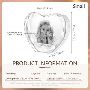 May include: A clear crystal heart-shaped ornament with a photo inside. The ornament is 3.14 inches wide, 1.57 inches tall, and 2.75 inches deep. The ornament is a small size. The text "Custom text" is visible inside the ornament.