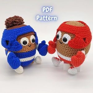 以下が含まれることがあります： 青いボクシンググローブと青いヘルメットをつけたクロシェのボクシングキャラクター2体。もう1体は赤いボクシンググローブと赤いヘルメットをつけたクロシェのボクシングキャラクター。キャラクターはどちらも茶色で白い目です。キャラクターの上に「PDF Pattern」というテキストがあります。