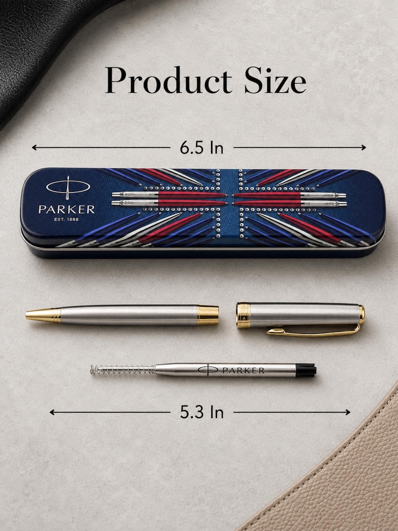 May include: A Parker ballpoint pen set featuring a silver-tone pen with gold-tone accents, a separate cap, and a refill cartridge. The metal storage case displays a Union Jack graphic and measures 6.5 inches, while the pen measures 5.3 inches.