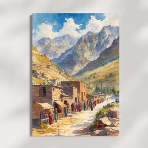 May include: Watercolor painting of a mountain village scene. The artwork depicts stone buildings, a dirt road, and people in colorful clothing. Mountains and a blue sky with clouds are in the background.