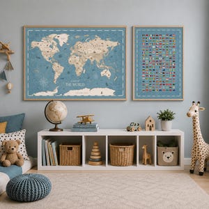 May include: Two framed wall prints featuring a blue world map with beige continents and a grid of international flags. The map includes the text A MAP OF THE WORLD. The prints are displayed above a white storage unit containing books, baskets, and toys.