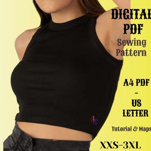 May include: A digital PDF sewing pattern for a black tank top. The pattern includes instructions and maps for sizes XXS-3XL. The pattern is available in A4 and US Letter sizes.