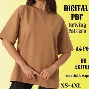 May include: A digital PDF sewing pattern for a brown oversized t-shirt. The pattern includes instructions and is available in sizes XS-4XL. The pattern is available in A4 and US Letter sizes.