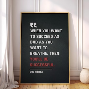 May include: Black and white motivational quote poster with a gold frame. The quote reads "When you want to succeed as bad as you want to breathe, then you'll be successful." - Eric Thomas.