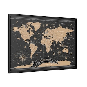 May include: A black framed canvas print of a world map with a vintage nautical theme. The map is beige with black lines and text. The text at the bottom reads "WORLD MAP" and "ANTARCTICA".