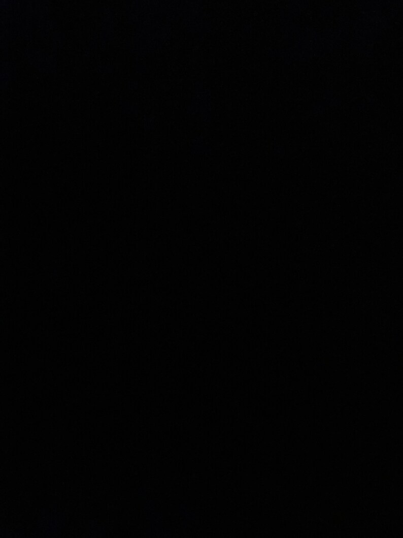May include: A black background.