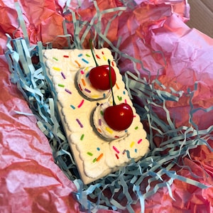 Fake Cake-uttagsskydd / Sockelskydd Set