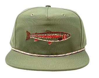 May include: Olive green flat-brimmed cap with an embroidered trout design. The trout has red, orange, and green details. The cap features a white and red rope detail around the brim and a button on top.