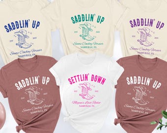 Custom Country Bachelorette Shirts, Saddlin’ Up, Personalized Nashville Bride Tee, Western Party Outfit, Cowgirl Wedding Trip Gift Idea