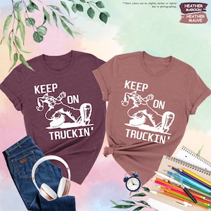 two t - shirts with the words keep on truckin on them