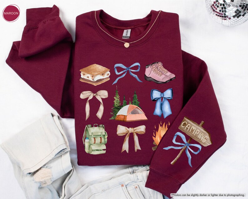 a pair of jeans and a sweater with different items on it