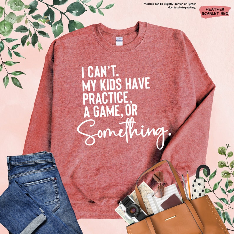 a sweater that says i can't my kids have a game or something