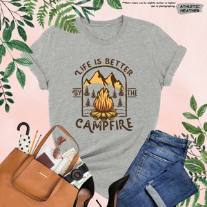 a t - shirt that says life is better by the campfire