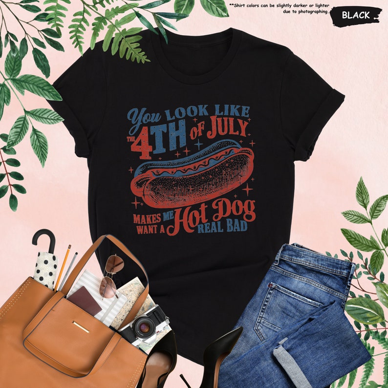a black shirt with a hot dog on it